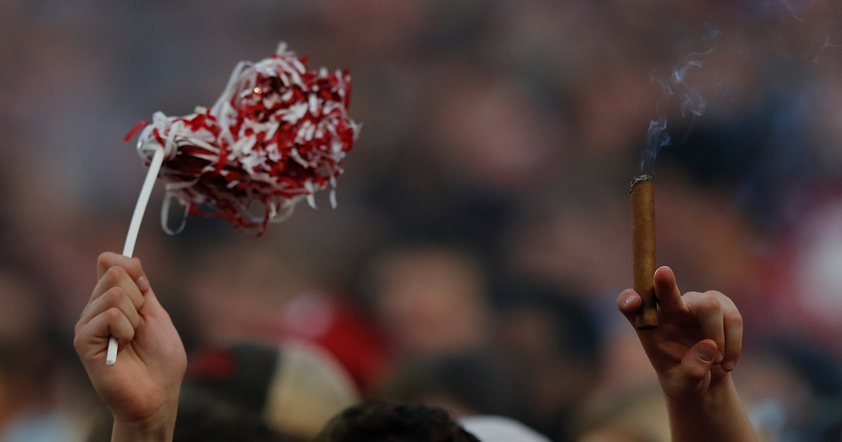 WATCH Alabama players smoke cigars on field after Tennessee victory On3