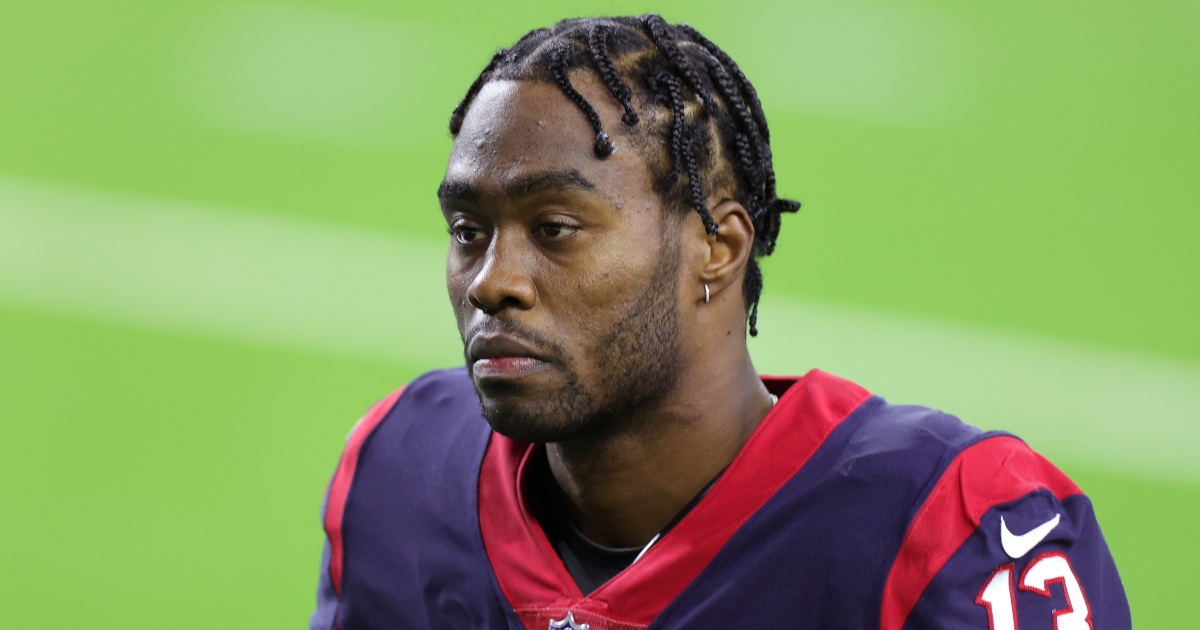 Brandin Cooks of the Houston Texans reacts after making a catch in