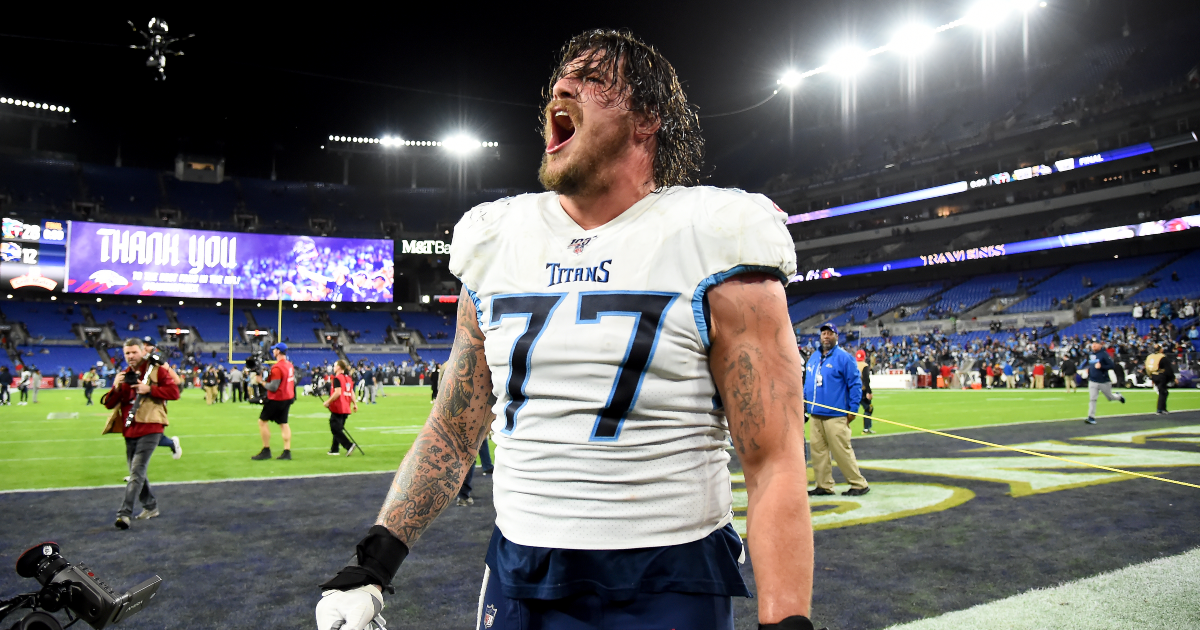 Titans' Taylor Lewan carted off with knee injury vs. Bills