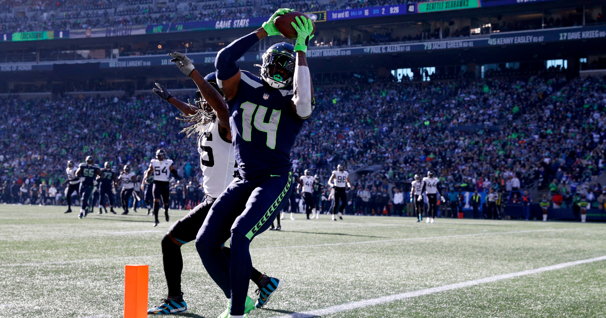 Seattle, United States. 30th Dec, 2019. Seattle Seahawks wide receiver D.K.  Metcalf (14) catches a 14 yard touchdown against San Francisco 49ers  cornerback Ahkello Witherspoon (23) during the fourth quarter at CenturyLink