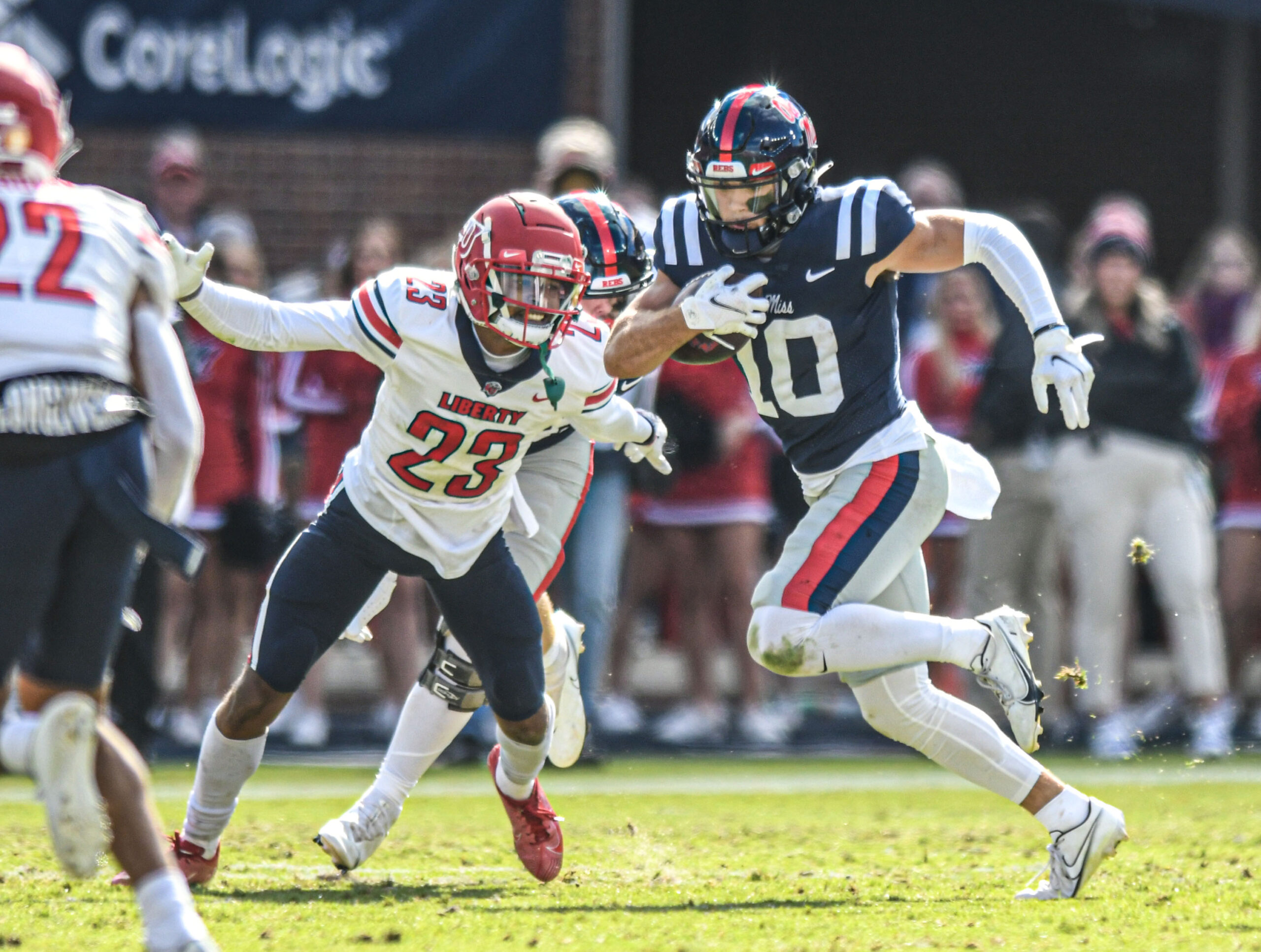 Ole Miss QB Matt Corral barrels over official on touchdown run