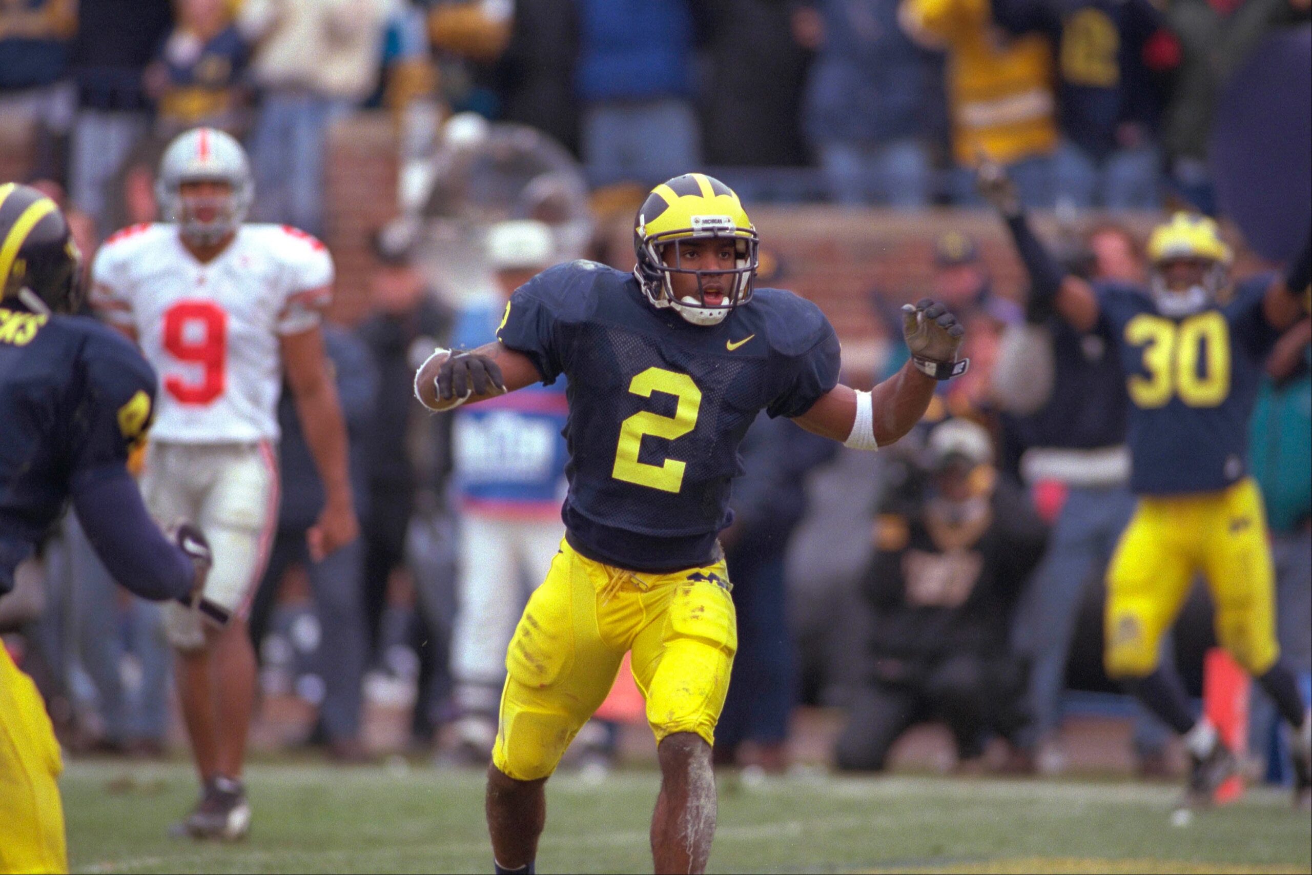 Charles Woodson Michigan Wolverines Autographed 16 x 20 Leaping  Interception