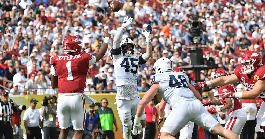 Linebacker Charlie Katshir jumps for football