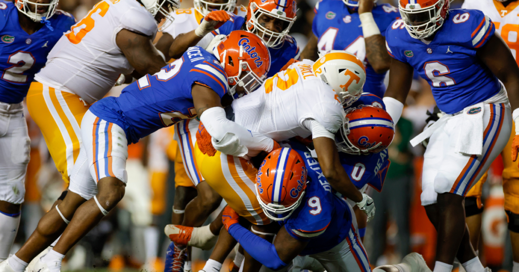 Florida Gators defenders converge to make a tackle