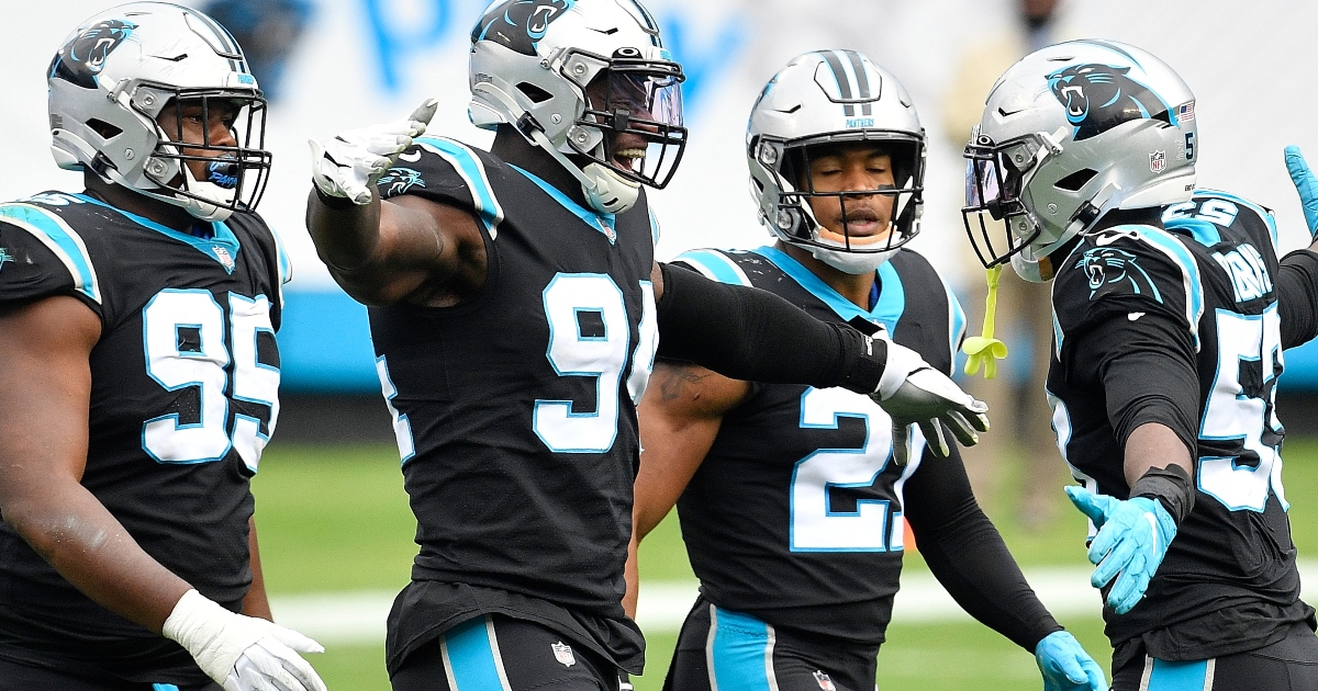 Carolina Panthers safety Jeremy Chinn warms up before an NFL