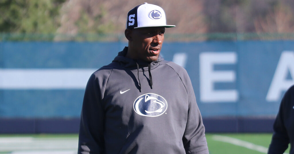 Penn State safety coach Anthony Poindexter leads a drill