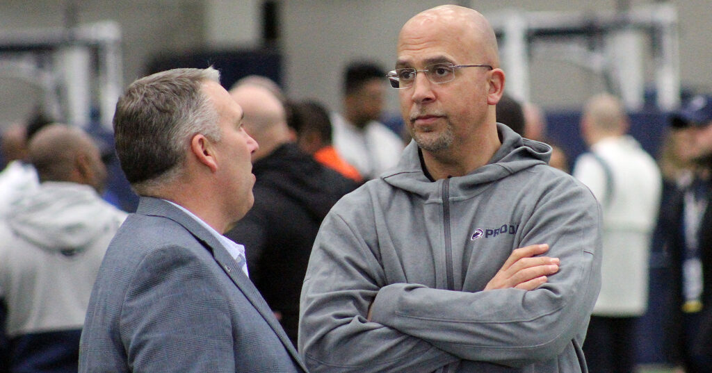 Penn State head coach James Franklin talks with Scott Sidwell