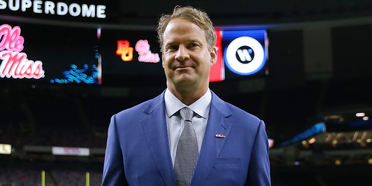 LOOK: Lane Kiffin poses for prom picture with Oxford High students