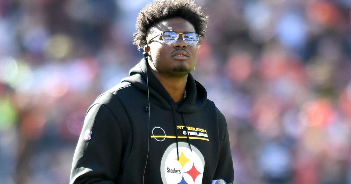 A Pittsburgh Steelers fans holds up a jersey of former quarterback Dwayne  Haskins before an NFL football game against the Cincinnati Bengals, Sunday,  Sept. 11, 2022, in Cincinnati. (AP Photo/Joshua A. Bickel