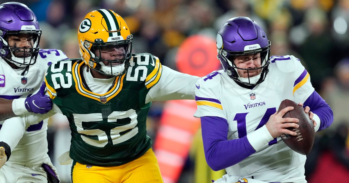 Green Bay Packers linebacker Rashan Gary (52) rushes during an NFL