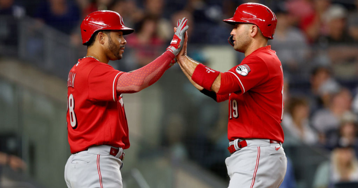 Young Reds fan sells out for home run ball, dives and secures Joey