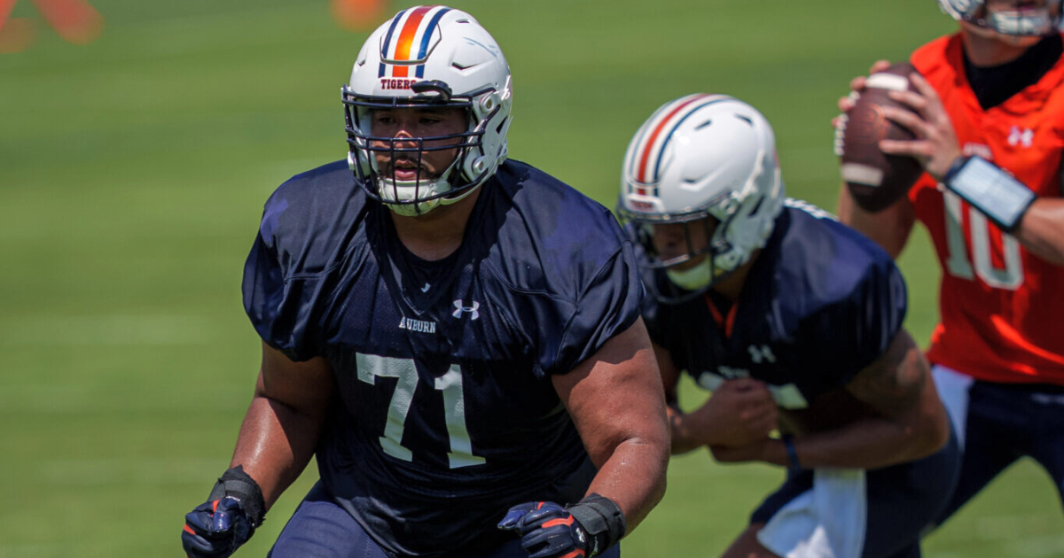 Brandon Council, Tate Johnson working at center for Auburn