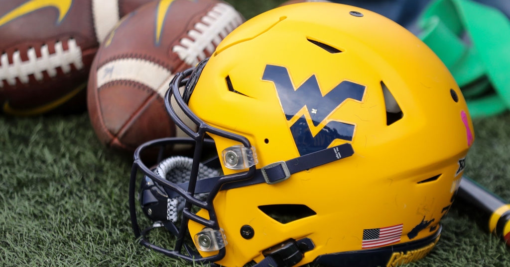WATCH Fan throws shoe onto field at players during West Virginia