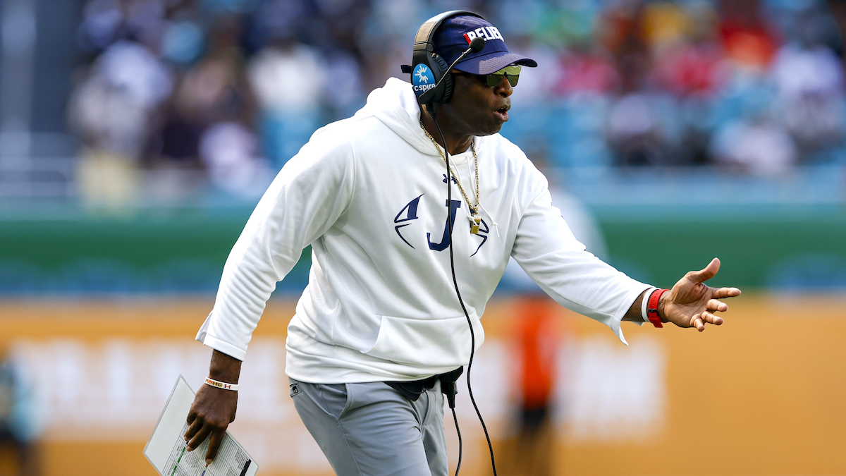 Defensive back Deion Sanders of the Atlanta Falcons looks on during News  Photo - Getty Images