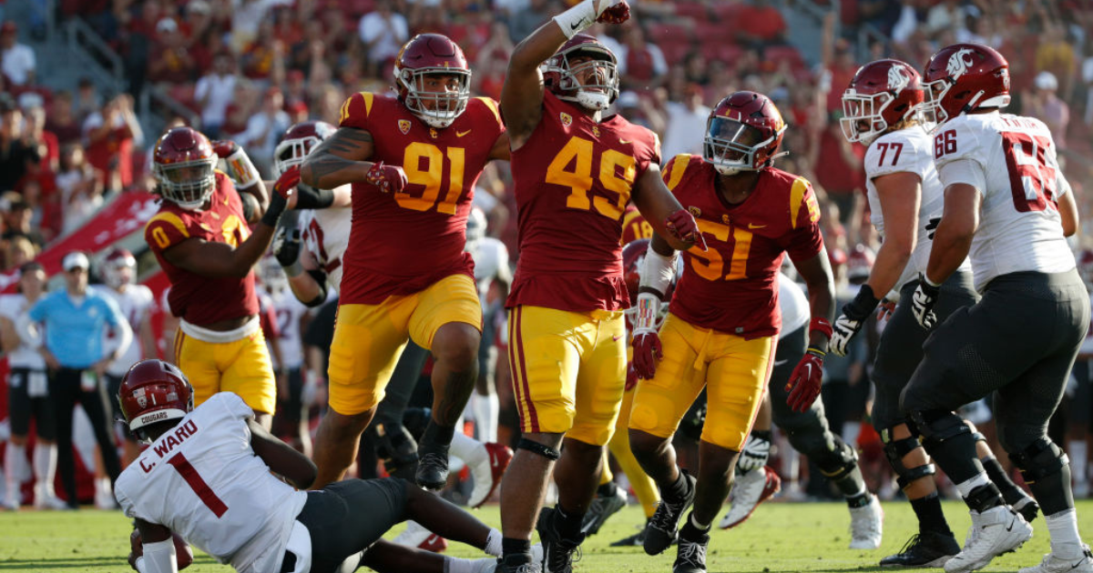 NFL draft: Chargers select USC DE Tuli Tuipulotu, Washington State