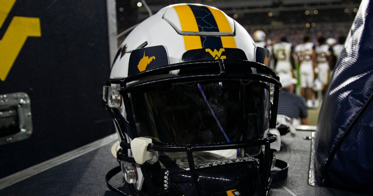 West Virginia defensive back Jasir Cox takes scoop and score 65yards