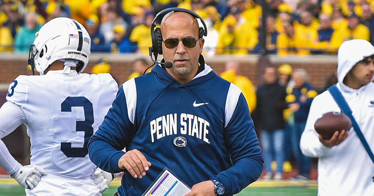 Watch Penn State head coach James Franklin do push-ups on the sideline