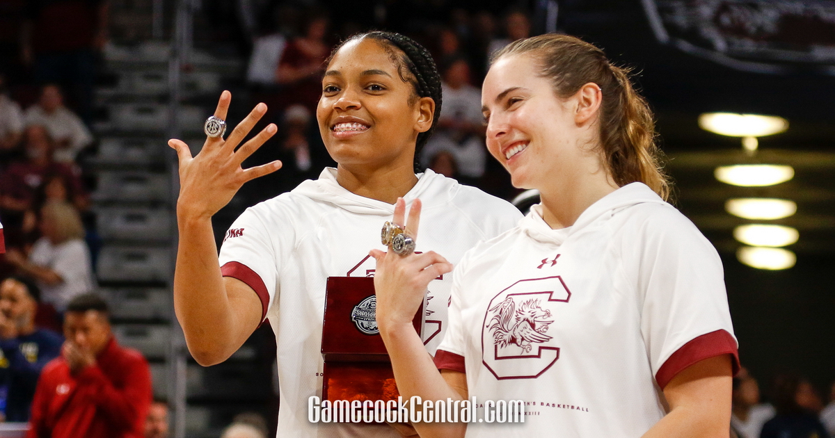 Dawn Staley and Zia Cooke share a moment after her rookie debut with t