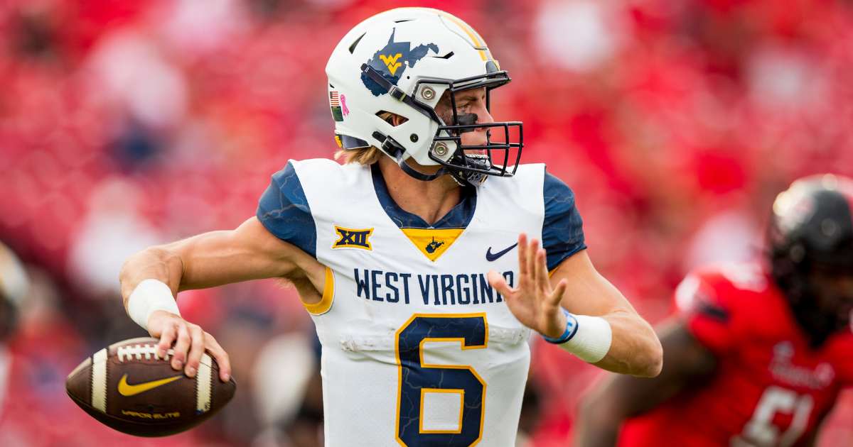 West Virginia QB Garrett Greene leaves game after hit to head, play