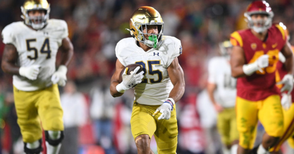 notre dame running back chris tyree carries vs usc