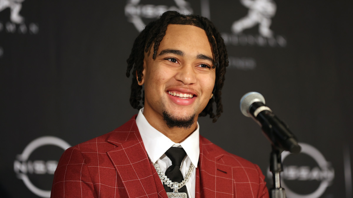 C.J. Stroud rocks red suit, No. 7 chain for Heisman ceremony