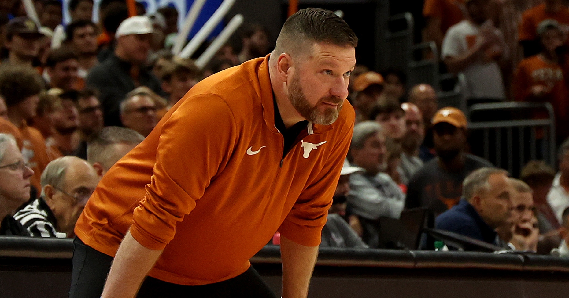 Texas suspends Chris Beard after arrest, names interim coach