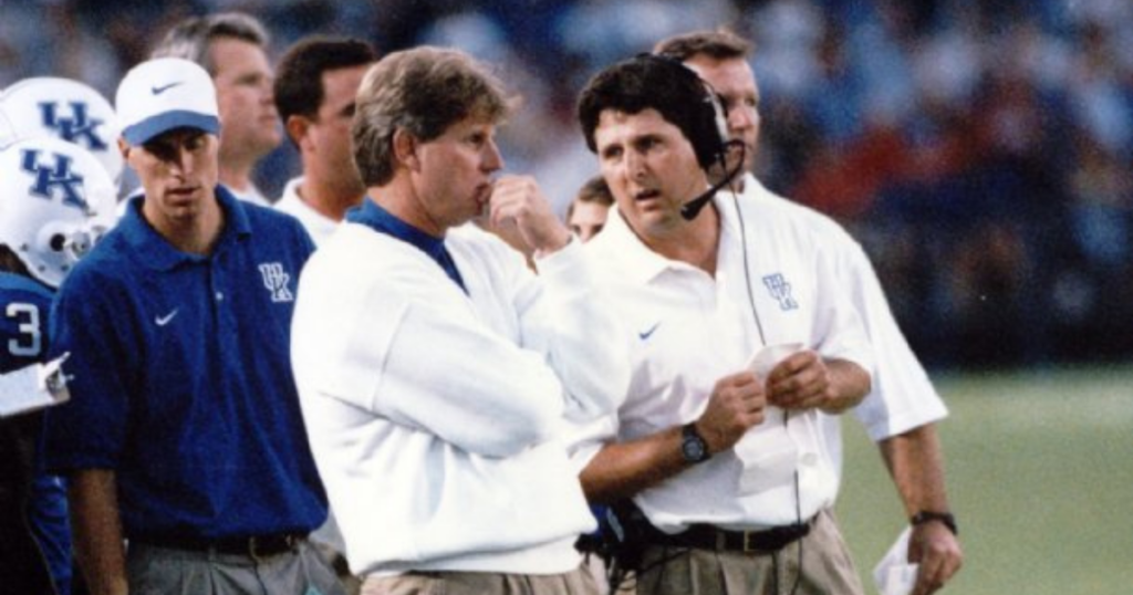 Mike Leach and Hal Mumme discuss plays on Kentucky's sideline