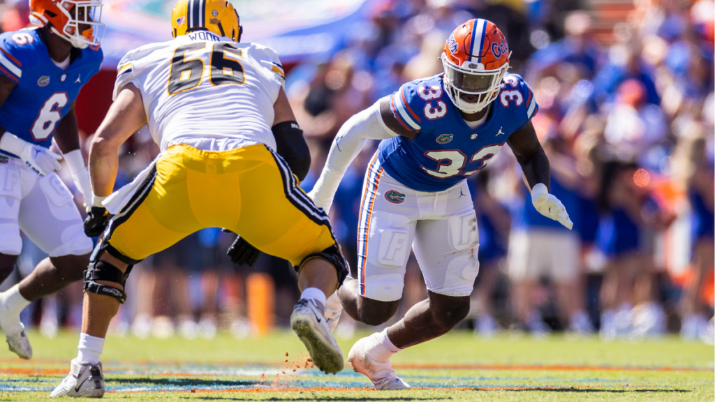 Florida Gators defensive end Princely Umanmielen rushes against Missouri
