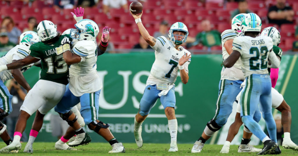 Michael Pratt #7 of the Tulane Green Wave passes during a game against the South Florida Bulls