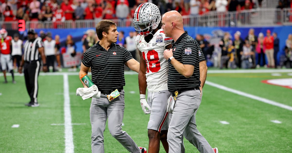 Marvin Harrison Jr. works with JUGS machine at OSU hotel ahead of Peach Bowl