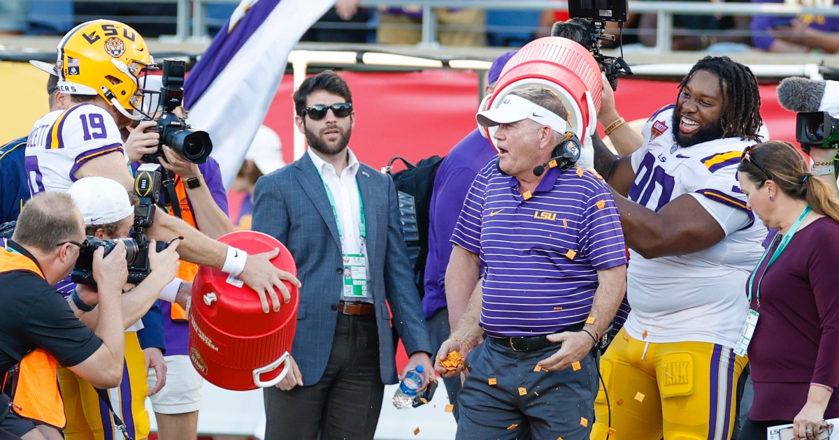 WATCH Brian Kelly picks CheezIt up off field, eats it in celebration