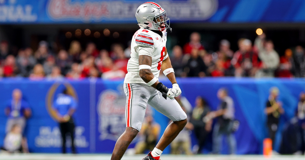 USA. 23rd Sep, 2023. September 23, 2023: Ohio State running back TreVeyon  Henderson (32) runs with the ball as Notre Dame defensive lineman Javontae  Jean-Baptiste (1) pursues during NCAA football game action