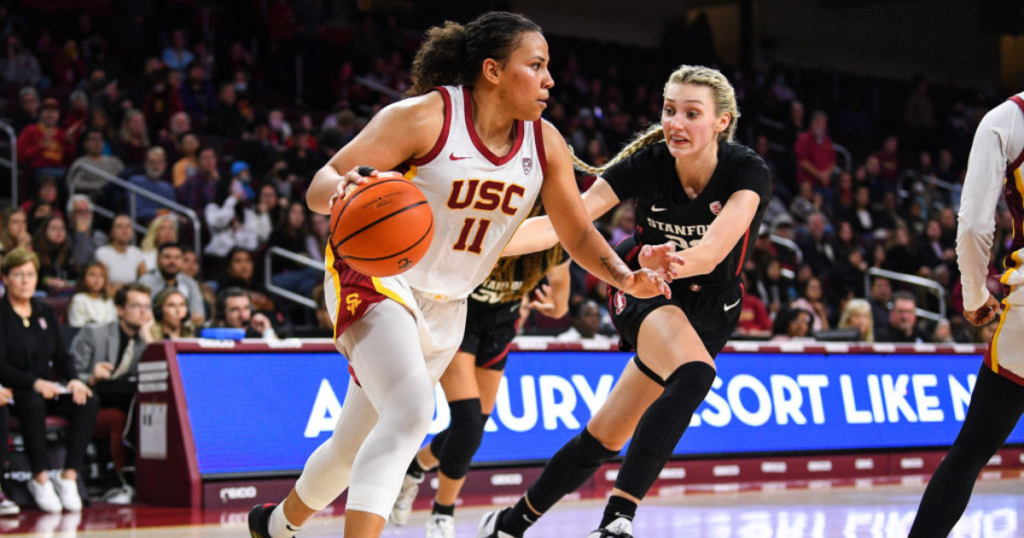 USC Trojans guard Destiny Littleton guarded closely by Stanford Cardinal forward Cameron Brink during the women's college basketball game between the Stanford Cardinal and the USC Trojans on January 15, 2023