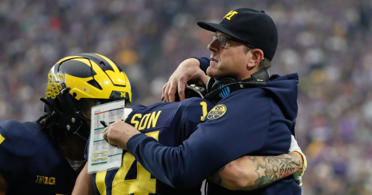 Jim Harbaugh calls Michigan president to say he's staying