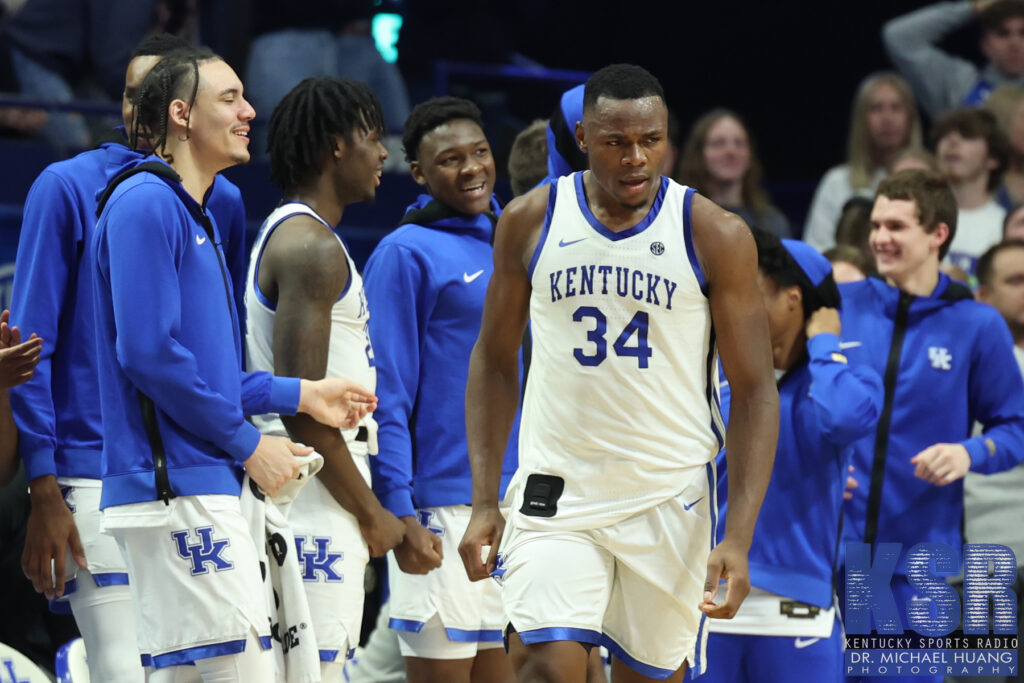 Kentucky center Oscar Tshiebwe celebrates big play in front of bench