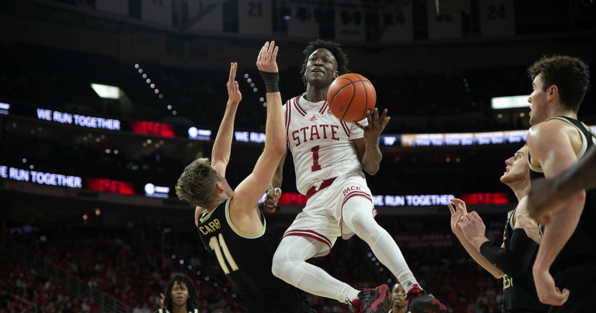 March 9, 2023: North Carolina State Wolfpack guard Jack Clark (5) knocks  the ball away from