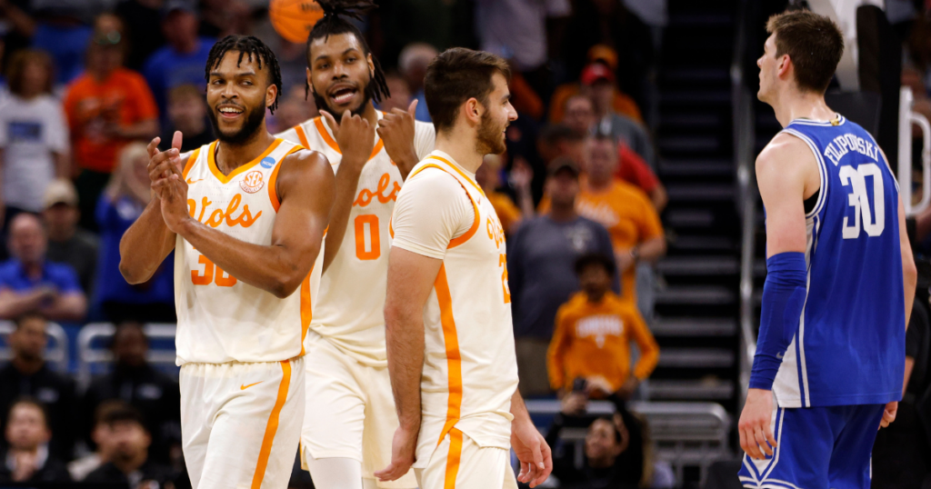 Tennessee's Josiah-Jordan James, Jonas Aidoo and Santiago Vescovi celebrate following their game against the Duke Blue Devils in the second round of the NCAA Men's Basketball Tournament