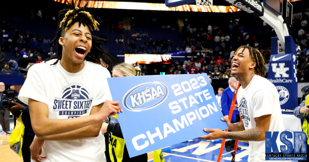Warren Central players celebrate winning the KHSAA state championship