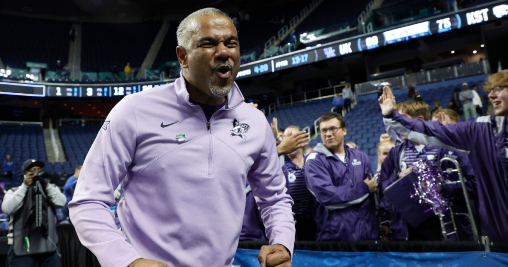 Head coach Jerome Tang of the Kansas State Wildcats celebrates after defeating the Kentucky Wildcats 75-69 in the second round of the NCAA Men's Basketball Tournament