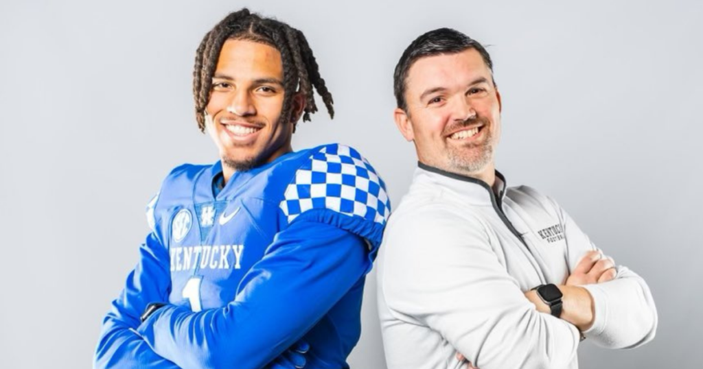 Class of 2024 four-star EDGE Jacob Smith (left) poses with Kentucky football defensive coordinator Brad White during Smith's visit to UK