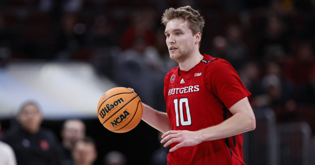 Rutgers guard Cam Spencer dribbles a basketball
