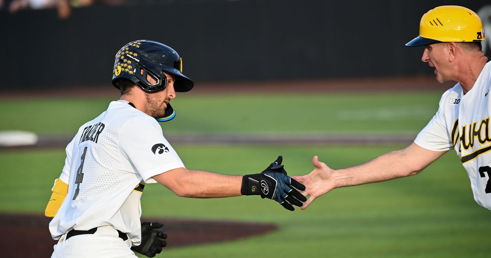 Hawkeyes run rule Michigan, win in Omaha opener