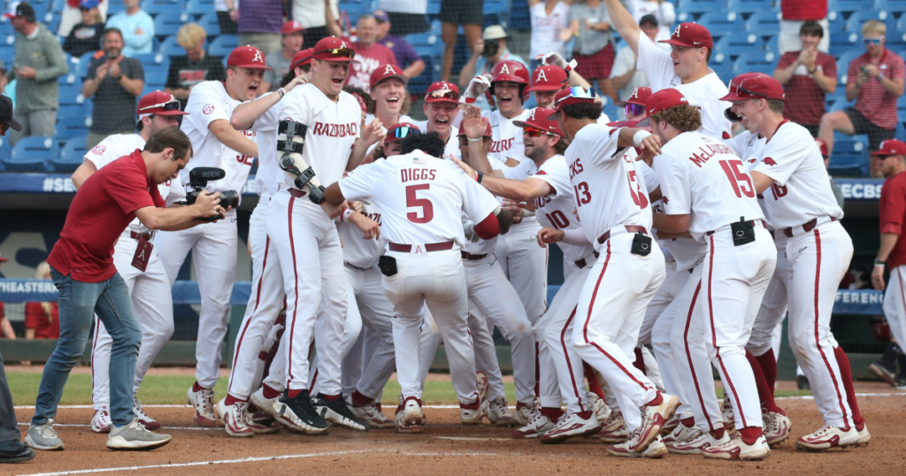 Kendall Diggs celebrates his walk-off home run with teammates