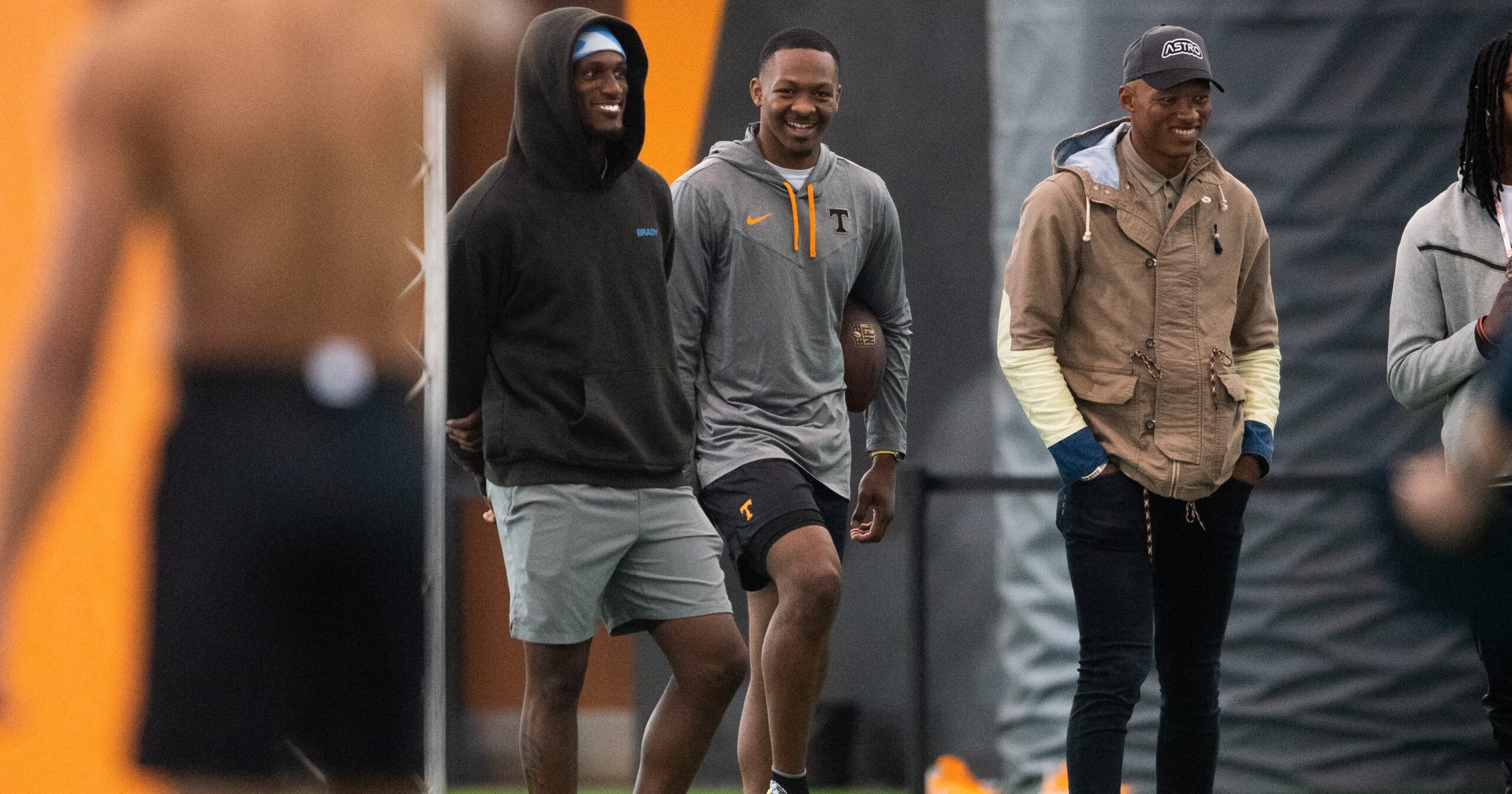 Peyton Manning extending a handshake to QB Joshua Dobbs