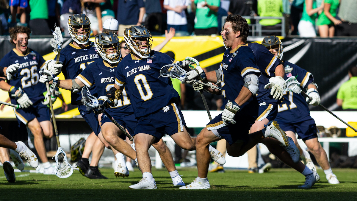 Marcus Freeman snaps pic with Notre Dame lacrosse’s Brian Tevlin after Final Four game winner