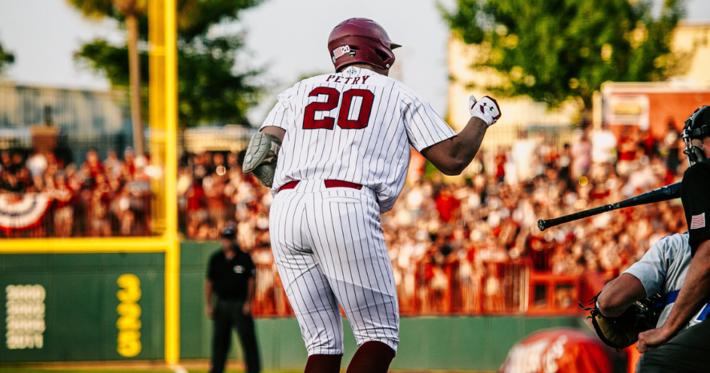 South Carolina right fielder Ethan Petry celebrates a walk against Central Connecticut