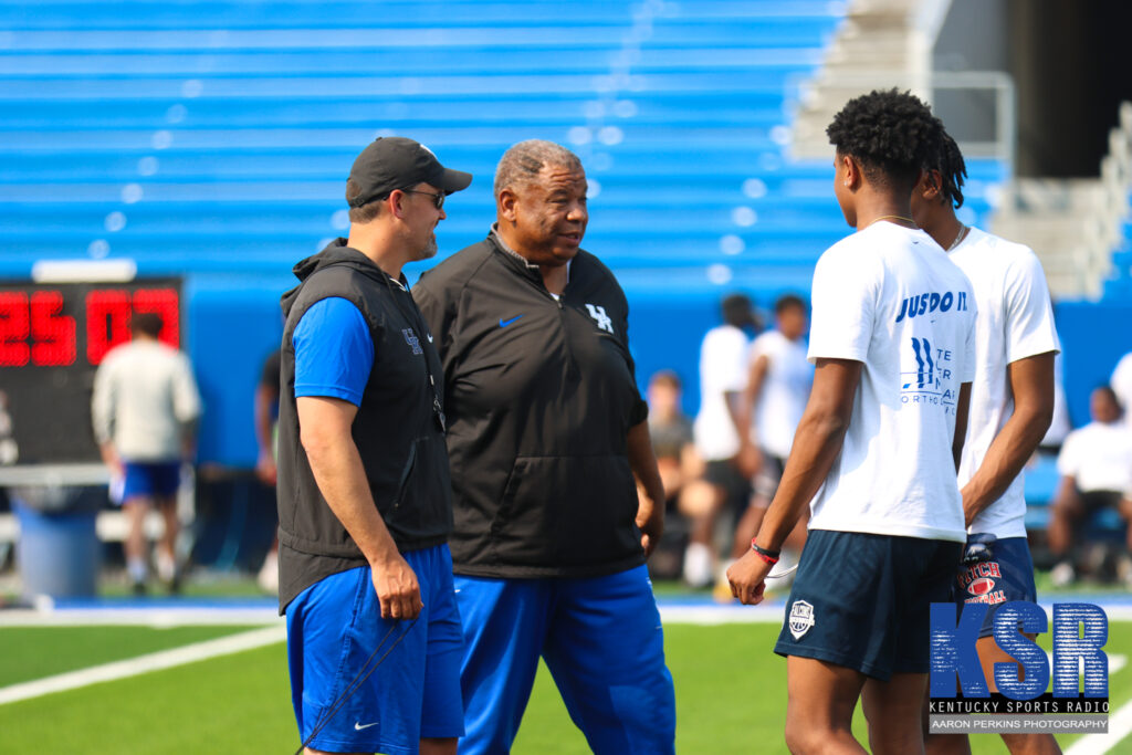 Brad White and Vince Marrow speak with campers