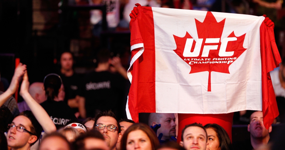 Railing collapses, fans spill over during UFC walkout