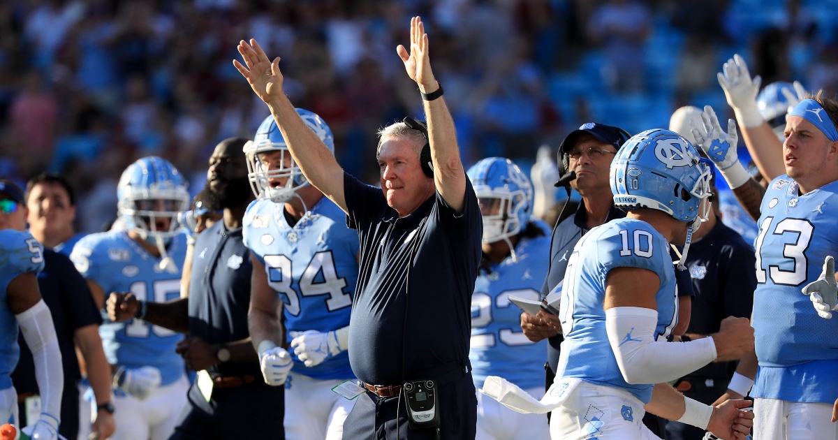 Mack Brown explains how he keeps bench from becoming chaotic