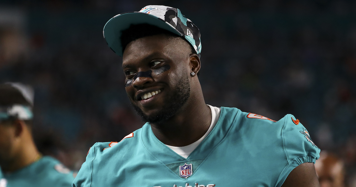 Miami Dolphins defensive end Emmanuel Ogbah (91) gets set on defense  against the Detroit Lions during an NFL football game, Sunday, Oct. 30,  2022, in Detroit. (AP Photo/Rick Osentoski Stock Photo - Alamy